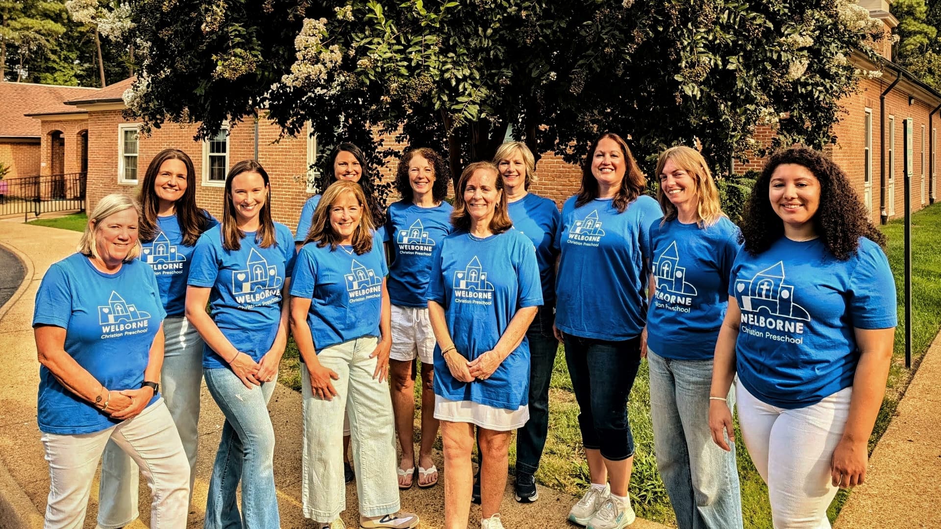 Welborne Christian Preschool teachers for the 2026–2027 school year, standing together in matching blue preschool shirts